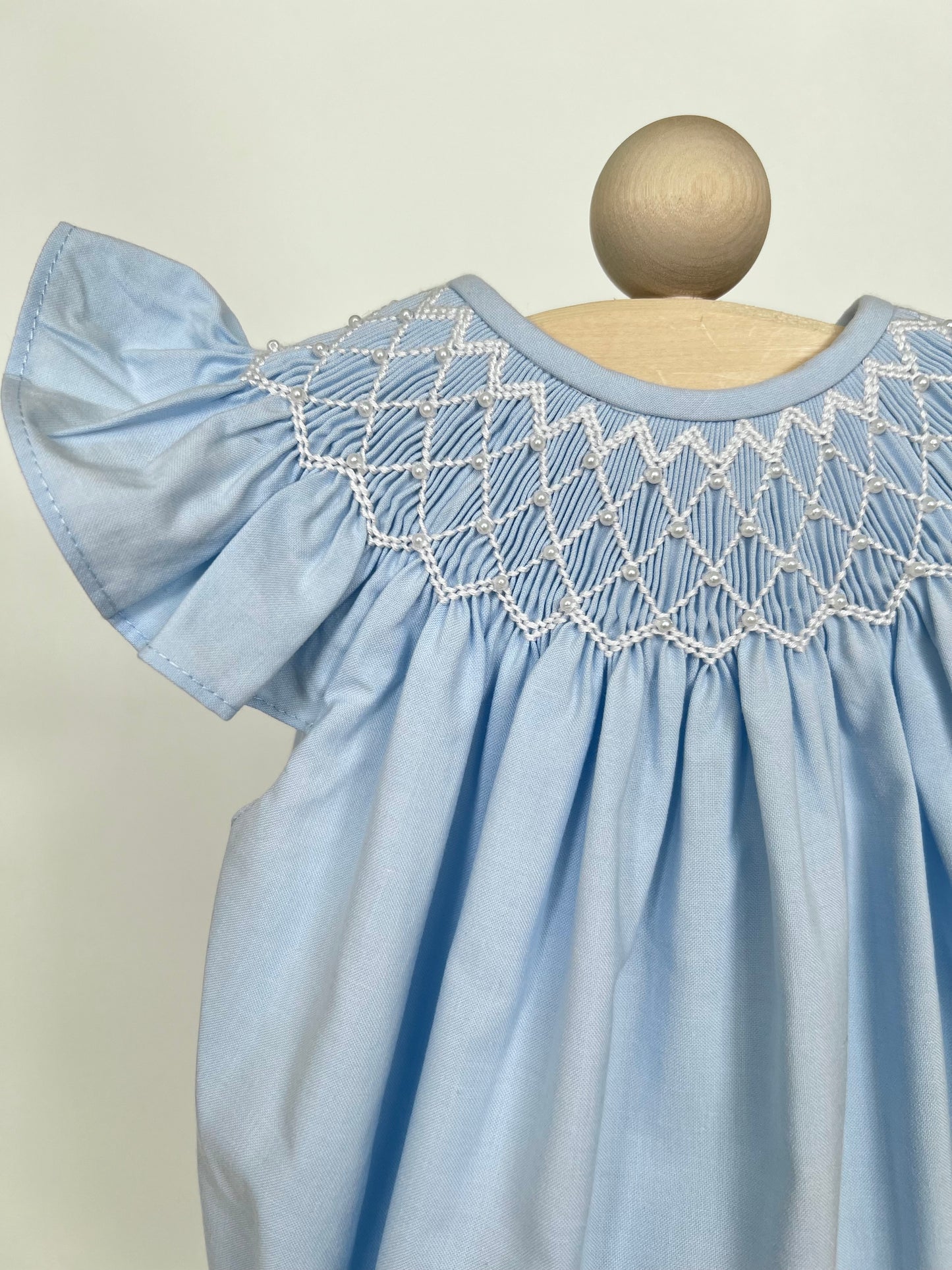 Catherine Pearl Smocked Blue Bubble